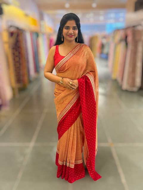 Red Crush Tissue Saree with Bandhini and Sabhya Borders