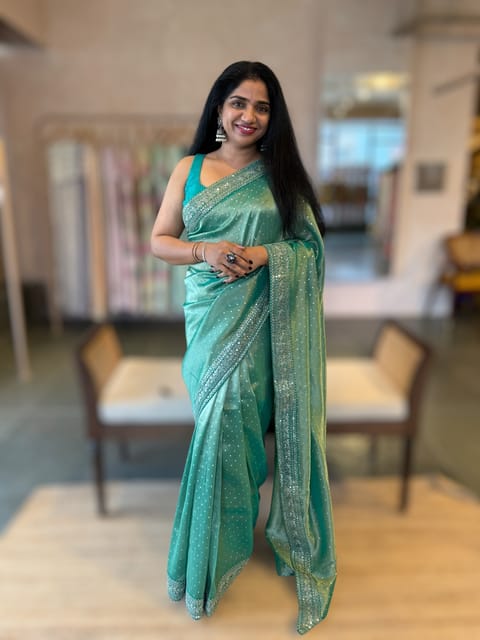 Teal Tissue Georgette Saree with Statement Borders and All-Over Pitawork Blouse