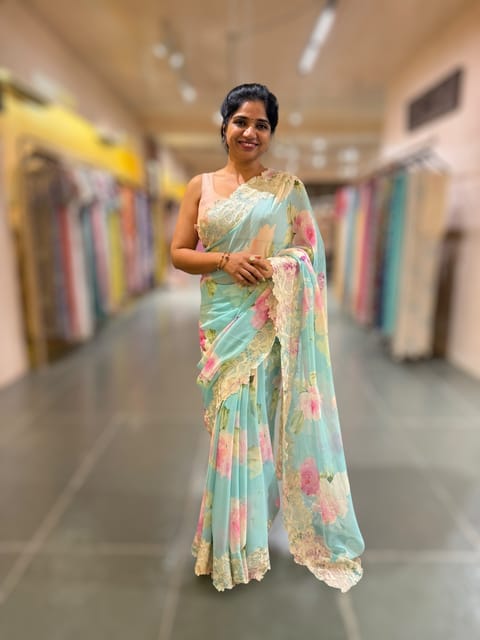 Pastel Blue Printed Georgette Saree with Chantilly Lace Style Embroidered Border