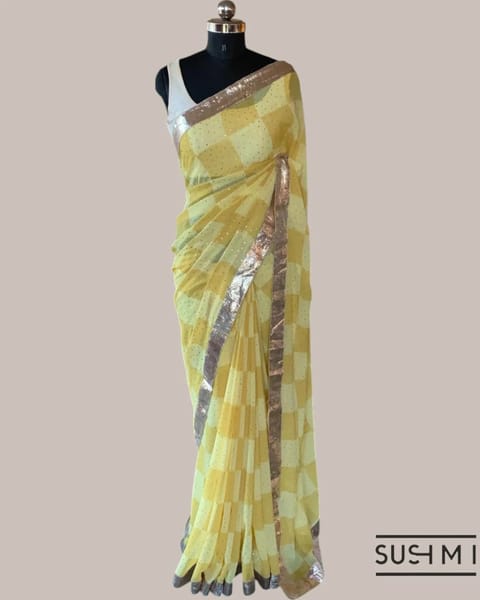 Pure Georgette Saree in Checks Pattern, All-Over Sequence and Hemlined with Gota Lace