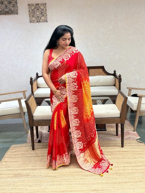 Orangish Red Designer Rai Bandhej Saree with Embroidered Border