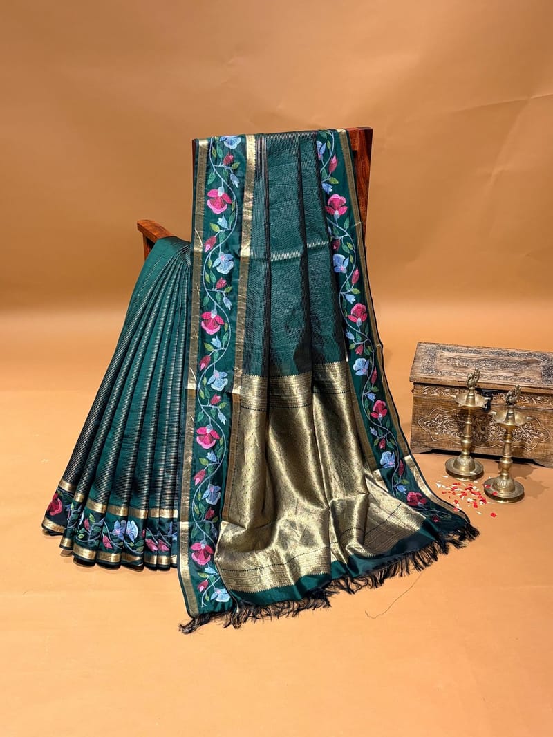 Emerald Green vintage stripes kanchi soft silk saree with jamdani inspired embroidered gap border