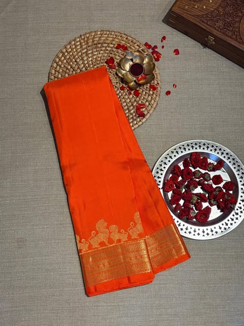 Orange Kanjeevaram Saree in Monotone Look with Designer Lion Border