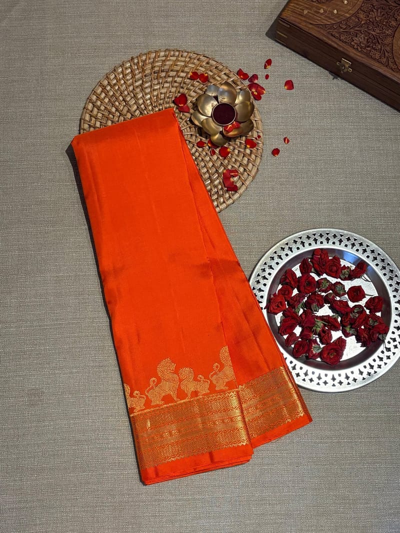 Orange Kanjeevaram Saree in Monotone Look with Designer Lion Border