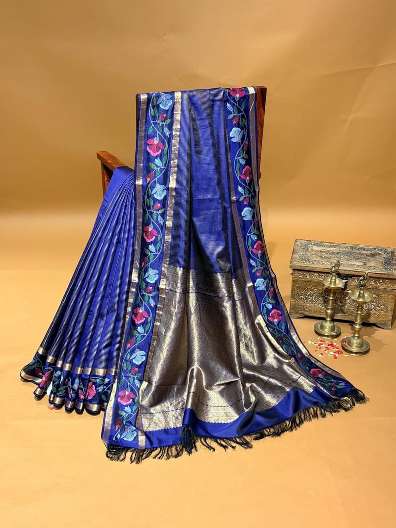 Midnight blue vintage stripes kanchi soft silk saree with jamdani inspired embroidered gap border