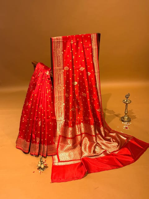 Orangish Red Banarasi Silk Saree with Kaduwa Weaving and Hand Done Bandhini
