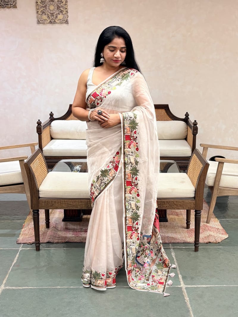 Designer Silver Tissue Saree with unique village theme embroidery 