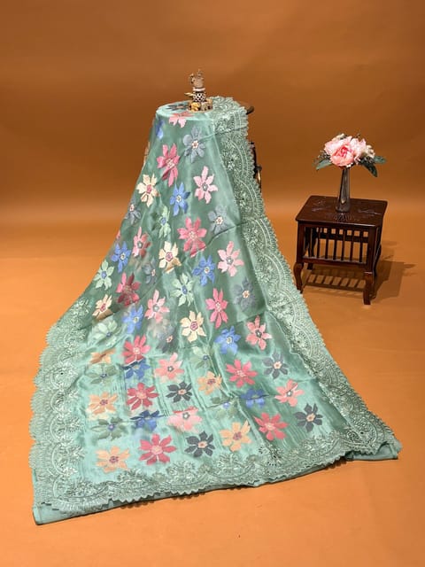 Sage Green Pure Organza Saree with Multicolour Jamdani-Inspired Floral Embroidery & Chantilly Lace Style Embroidered Cutwork Border