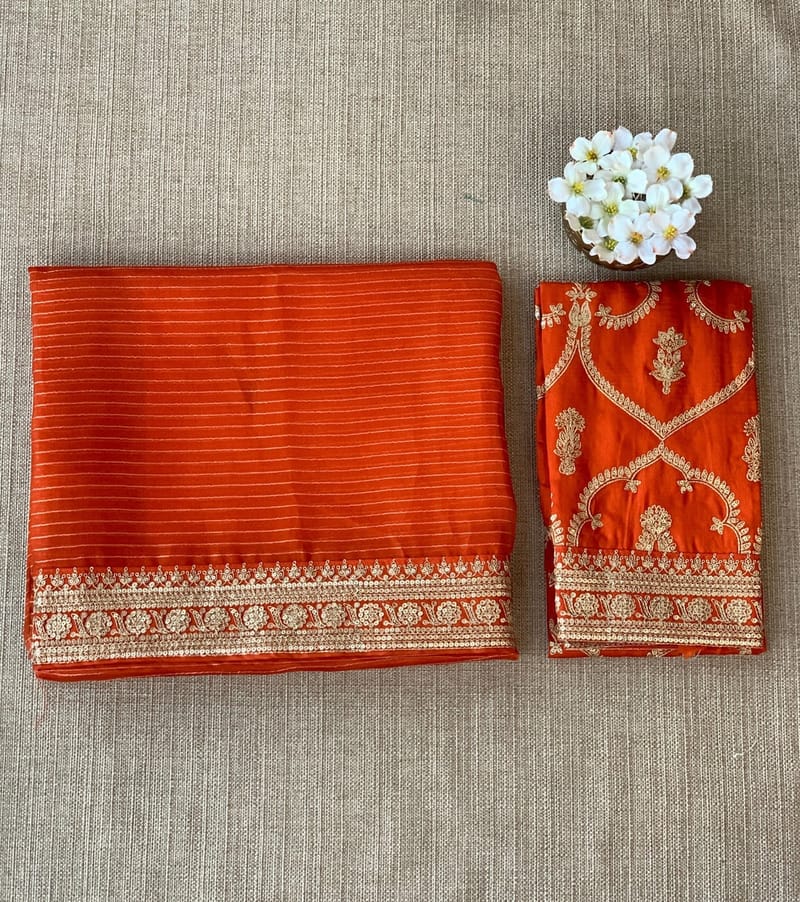 Rust Orange Organza Saree with sabhyasachi borders and blouse