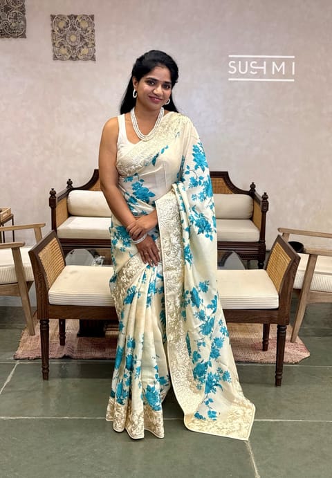Ivory Floral Printed Tussar Saree with Parsi Gara Embroidered Border