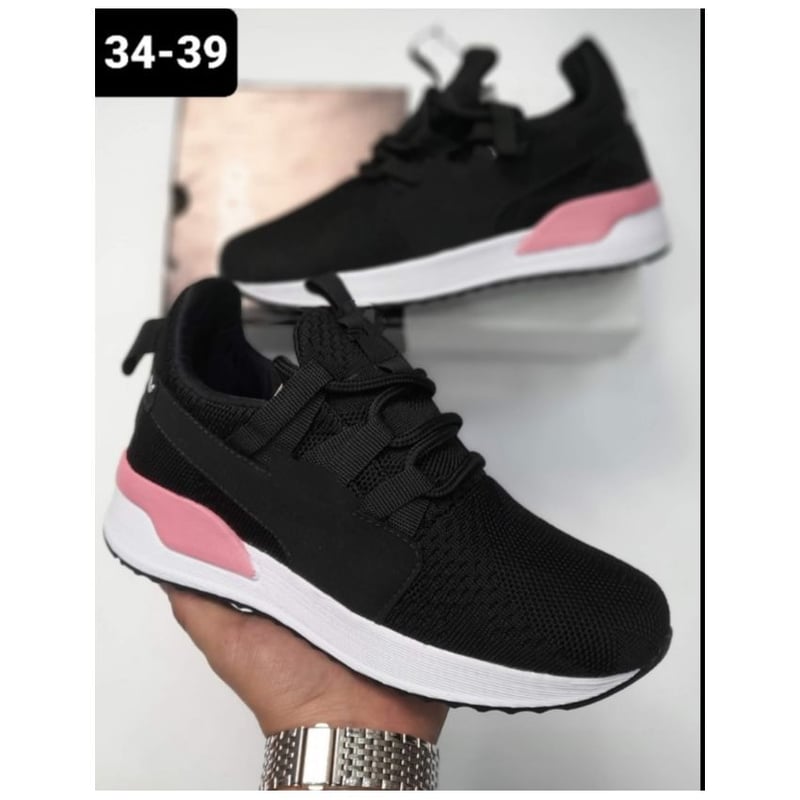 Tenis negro con blanco mujer sale