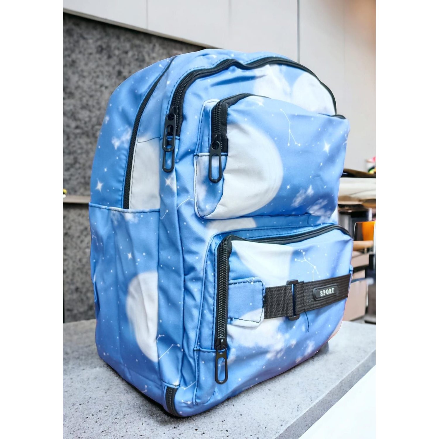 MOCHILA ESCOLAR TIPO GALAXIA 360 CELESTE GENERICO falabella