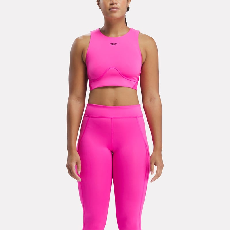 Top deportivo mujer reebok hotsell