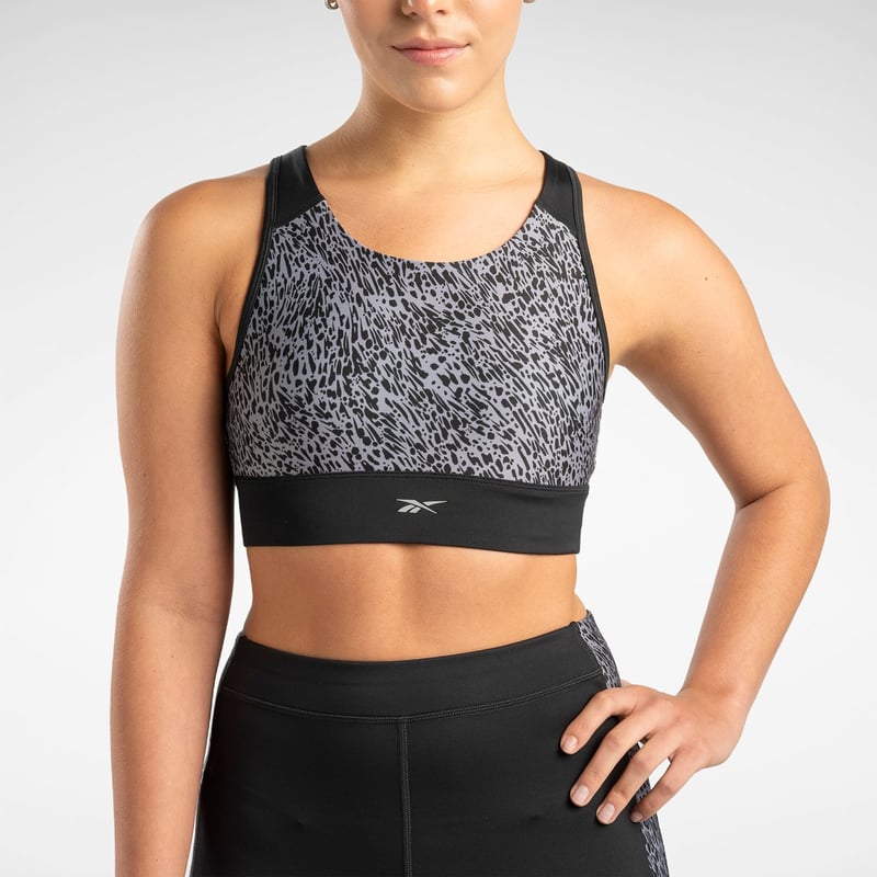 Top deportivo mujer reebok hotsell