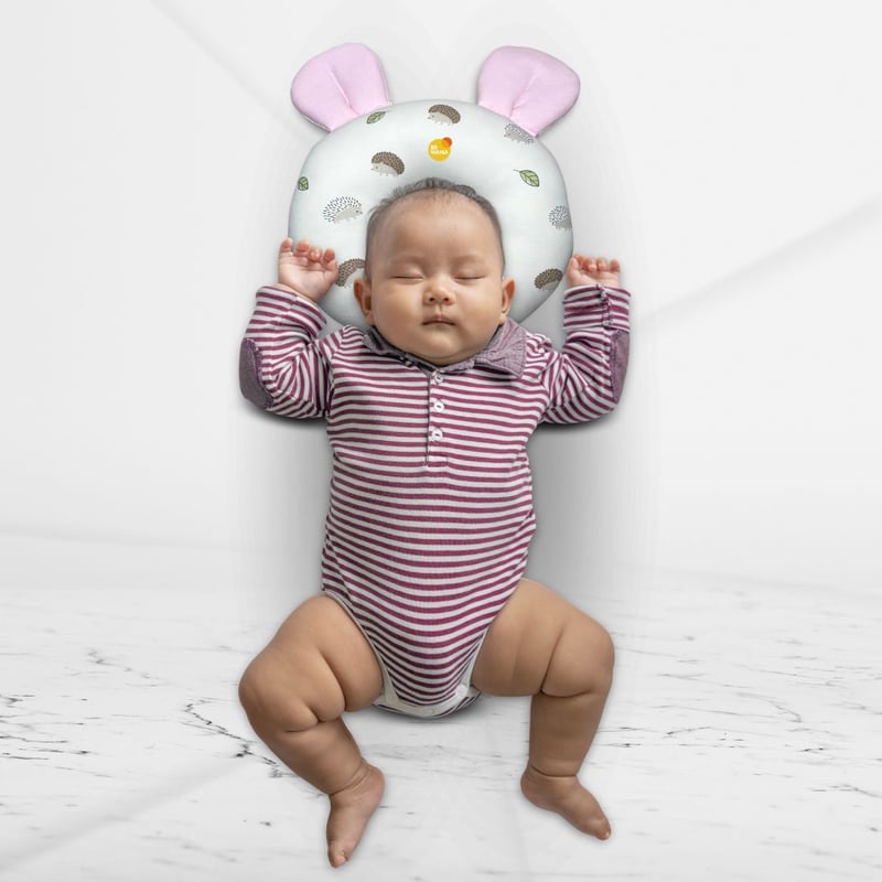 Almohada Anti cabeza Plana para Bebe OREILLE Pink CUZKA falabella