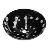 Bacha de vidrio negra con círculos blancos