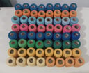 130 unidades de hilos de bordar (colores varios)