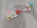 Guitarra de juguete a pila con música (Nuevo)