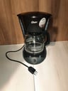 Cafetera Oster 220v, para 12 tazas (poco uso, en buen funcionamiento)