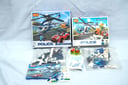 Set de construcción de la marca COGO de la serie Police, llamado Aerial Patrol incluye 164 piezas para construir un helicóptero de policía y una motocicleta + Set de construcción de la marca COGO de la serie City Police o Persecución en alta velocidad, incluye 229 piezas para construir un helicóptero de policía y un vehículo de escape para un ladrón (Ambos usados, podrian faltar algunas piezas) (En caja, Buen estado)