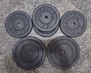4 unidades de discos de pesa de 5k + 2 discos de 10k