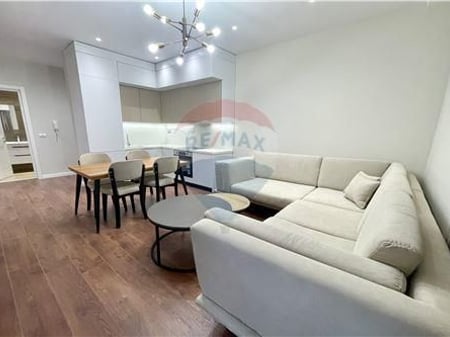 Appartamento in affitto + posto auto presso Garden Building