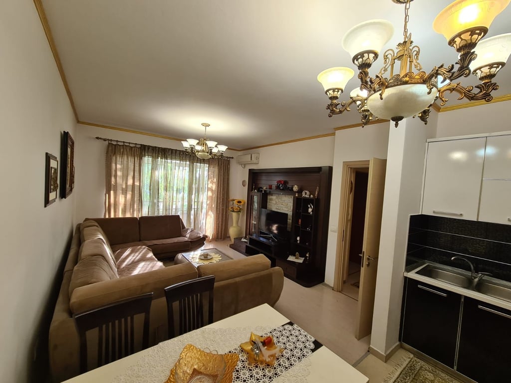 A 1+1 apartment is available for rent in front of the church in Don Bosko.