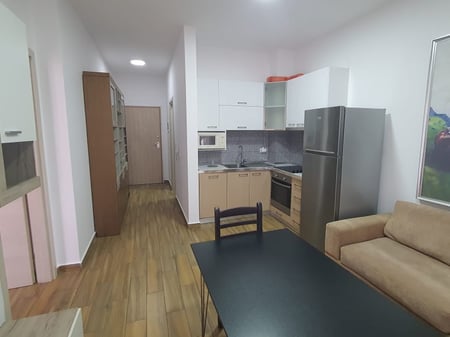 1+1 me Qira te Komuna e Parisit, Kompleksi Kika 2