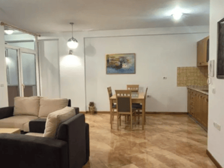 A 3+1 apartment is available for rent at the former Exhibition Center near Myslym Shyri.