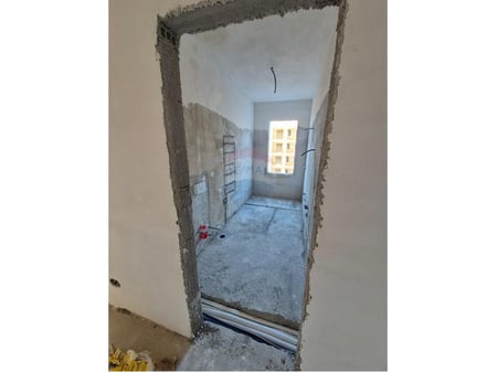 For sale is a 3-bedroom apartment with 2 parking spaces.