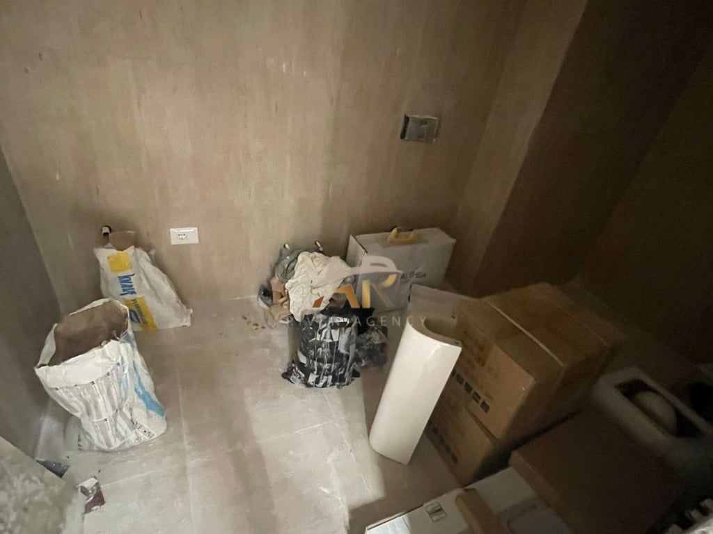 A 1+1 apartment is for rent, unfurnished, in a newly completed building.