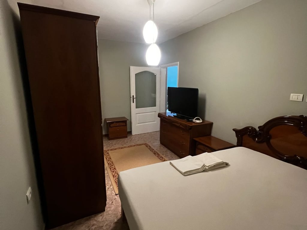 An apartment is for rent in the Center.