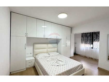 1+1 APARTMENT, MYSLYM SHYRI