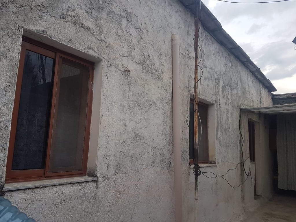 A one-story house is for sale on Myslym Keta Street.