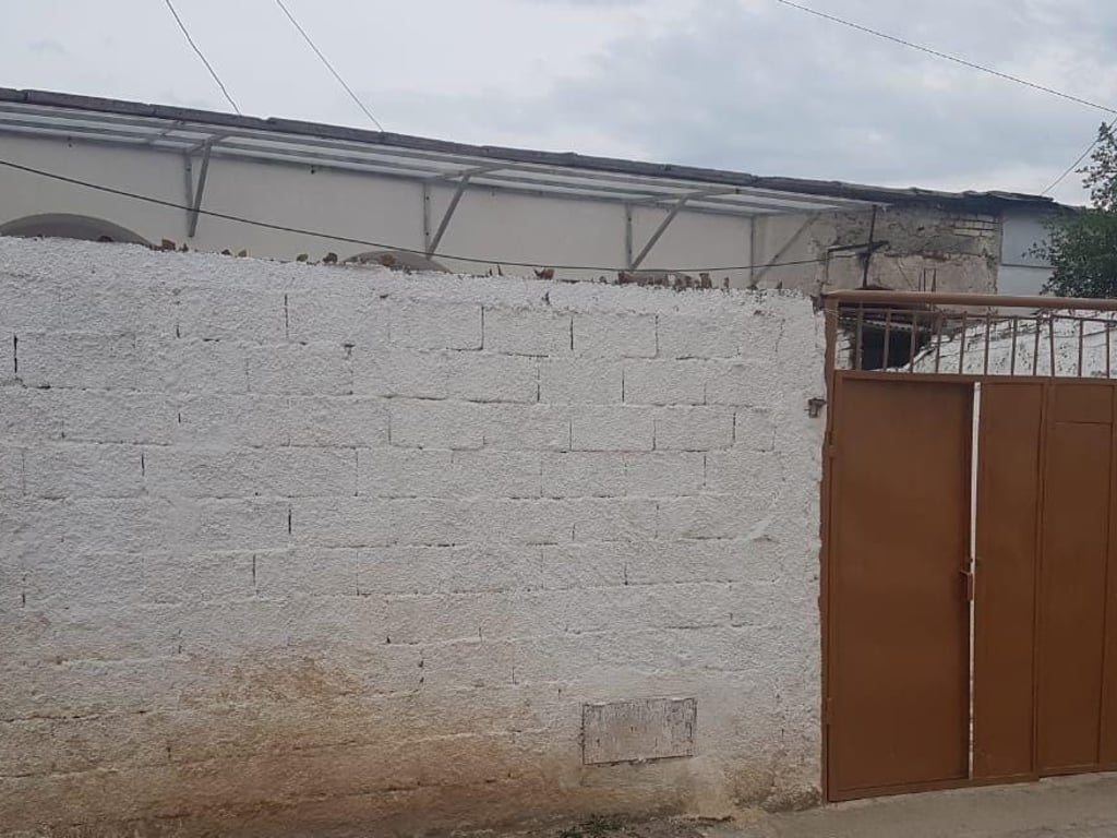 A one-story house is for sale on Myslym Keta Street.