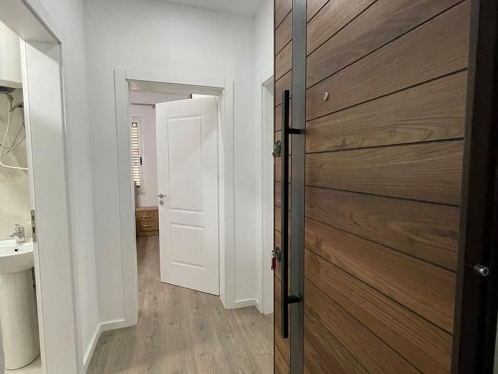 An apartment 1+1 is for rent, near the Municipality Overpass (Kodra e Diellit) next to Aldi market for 450,000 lek.