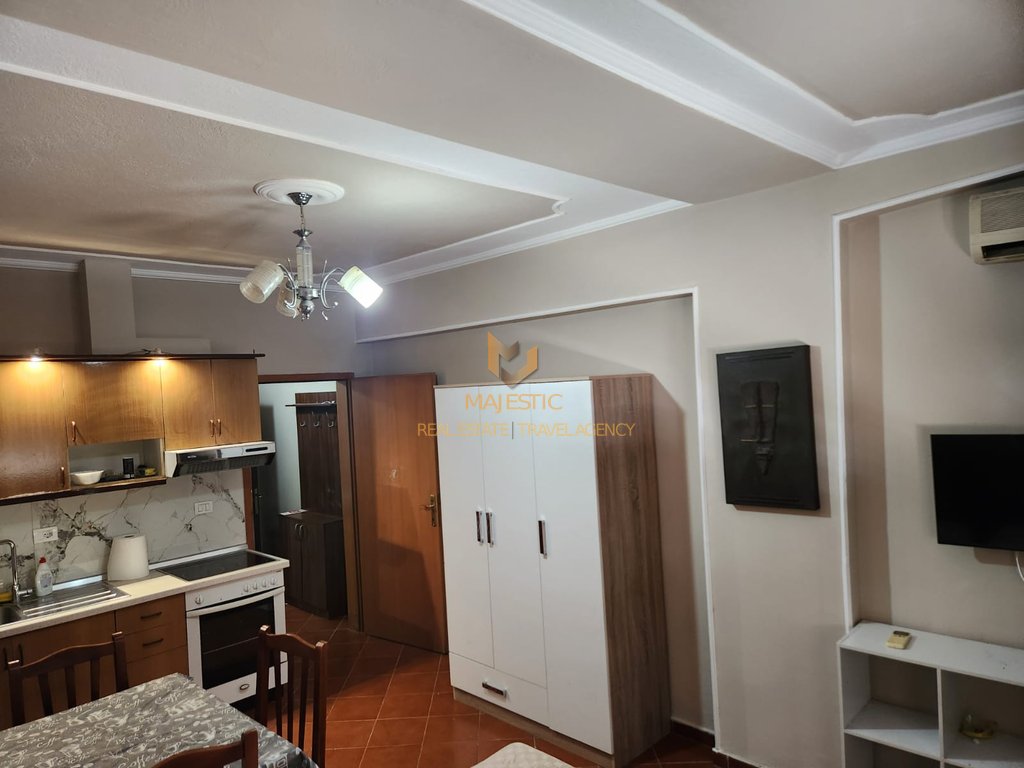 A studio apartment is available for rent near Petro Nini school, opposite the Deshmoret e Lirise high school.