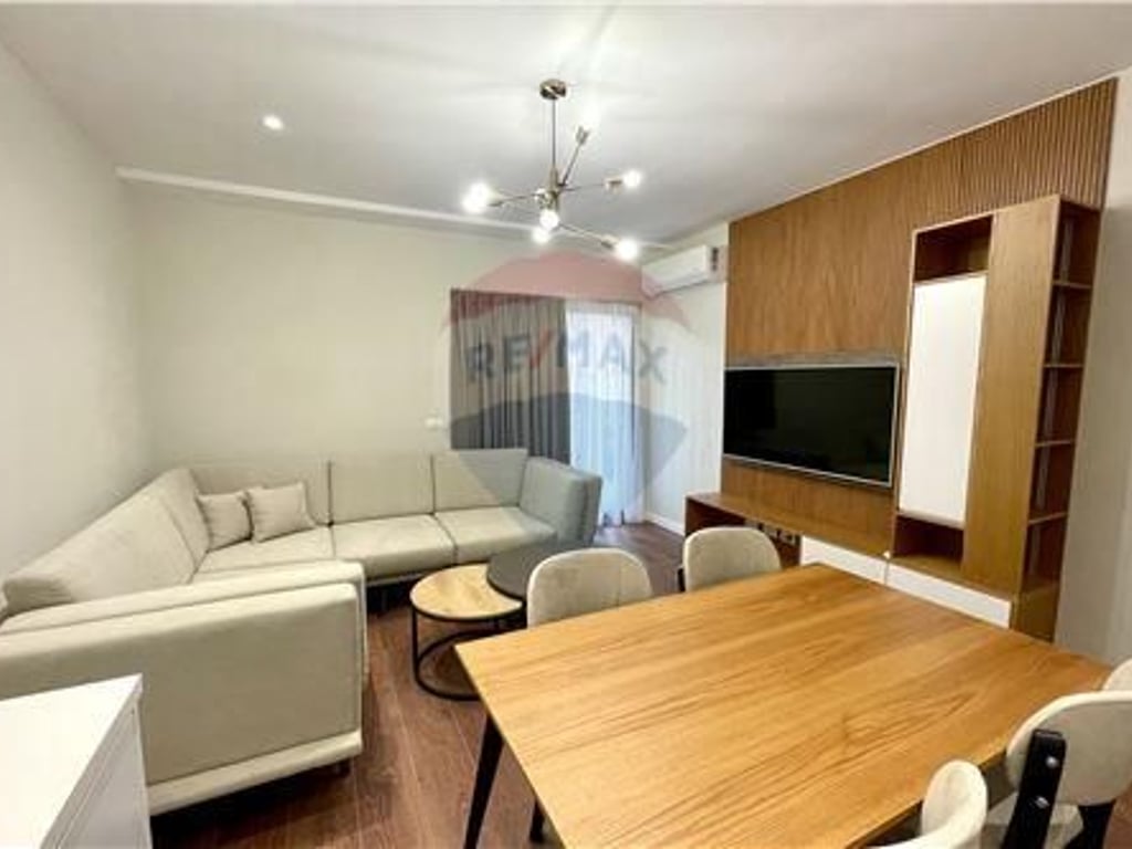 Appartamento in affitto + posto auto presso Garden Building