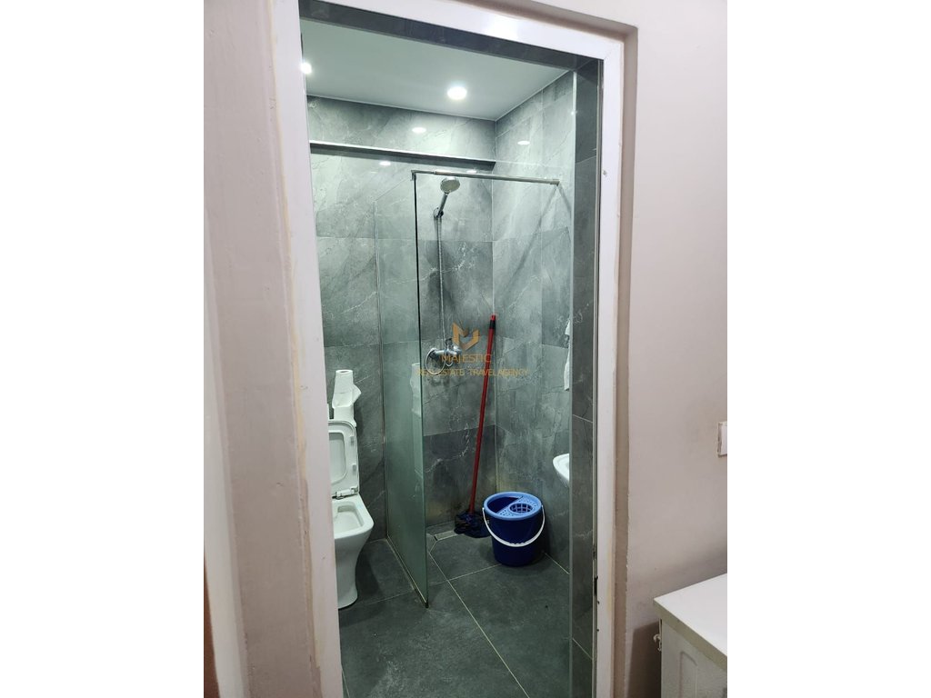A studio apartment is available for rent near Petro Nini school, opposite the Deshmoret e Lirise high school.