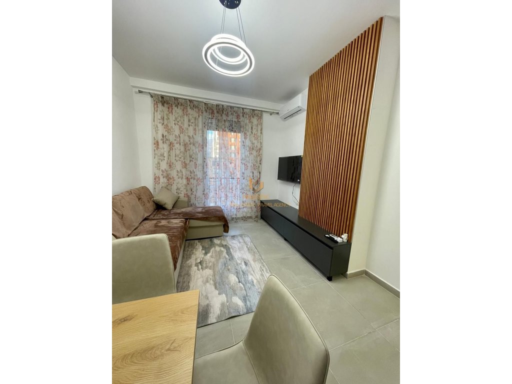 A 1+1 apartment is available for rent near the Red School.
