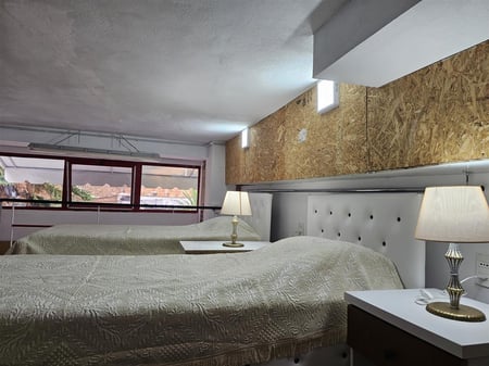 A studio apartment is for rent near the pediatric clinic.