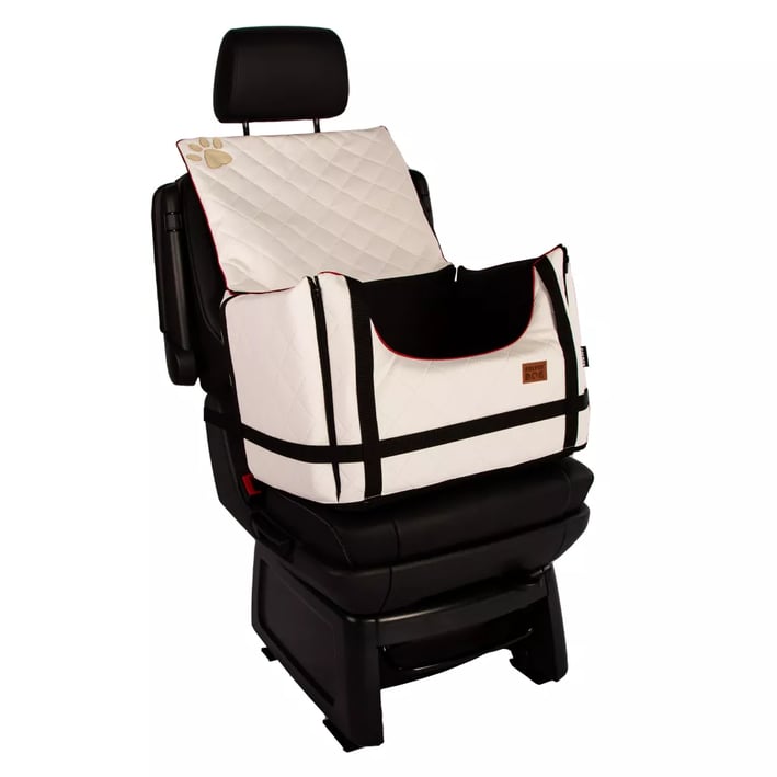white dog car seat