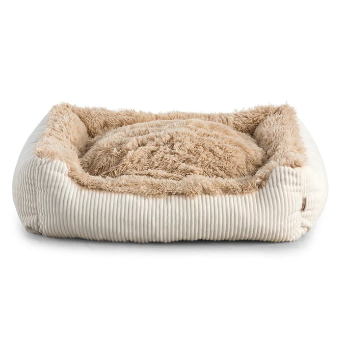 beige shaggy dog bed