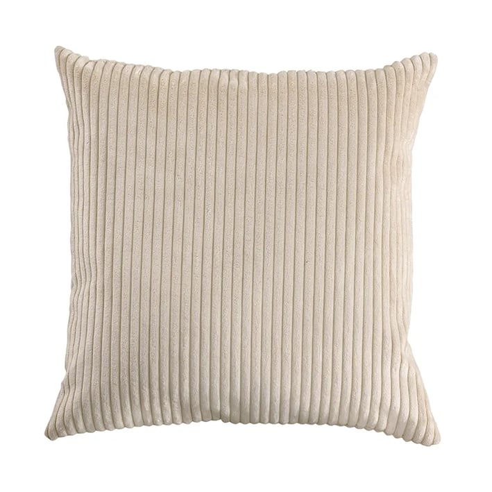 beige decorative cushion