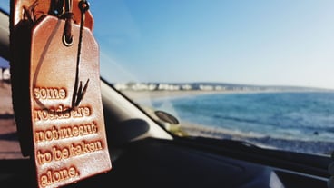 Close-up of clothes hanging on beach