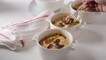 Julienne with chicken and mushrooms with a golden crust ,  baked cheese