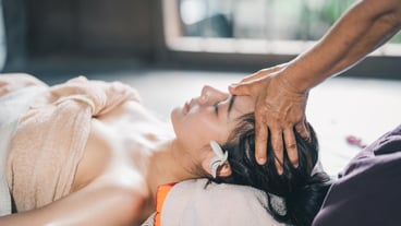 Massage and spa relaxing treatment of office syndrome traditional thai massage style Asain female masseuse doing massage treat back pain arm pain and stress for office woman tired from work