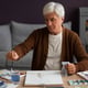 Senior painter using watercolor for his art