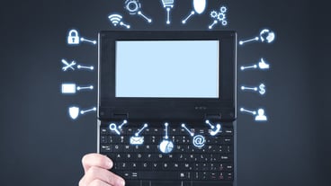 Male hand showing computer and business, network symbols.