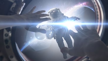First person view of person cover from light in the window onpacecraft